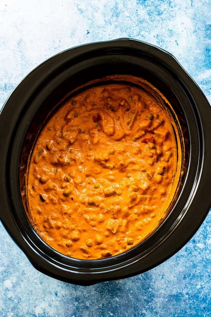 Potato and chickpea tikka masala in a slow cooker viewed from overhead