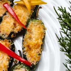 A close up of a jalapeno popper that is part of a Christmas Tree platter