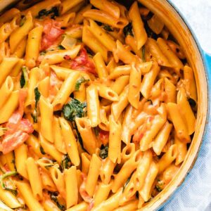 Vegan one-pot pasta in a blue dutch oven.