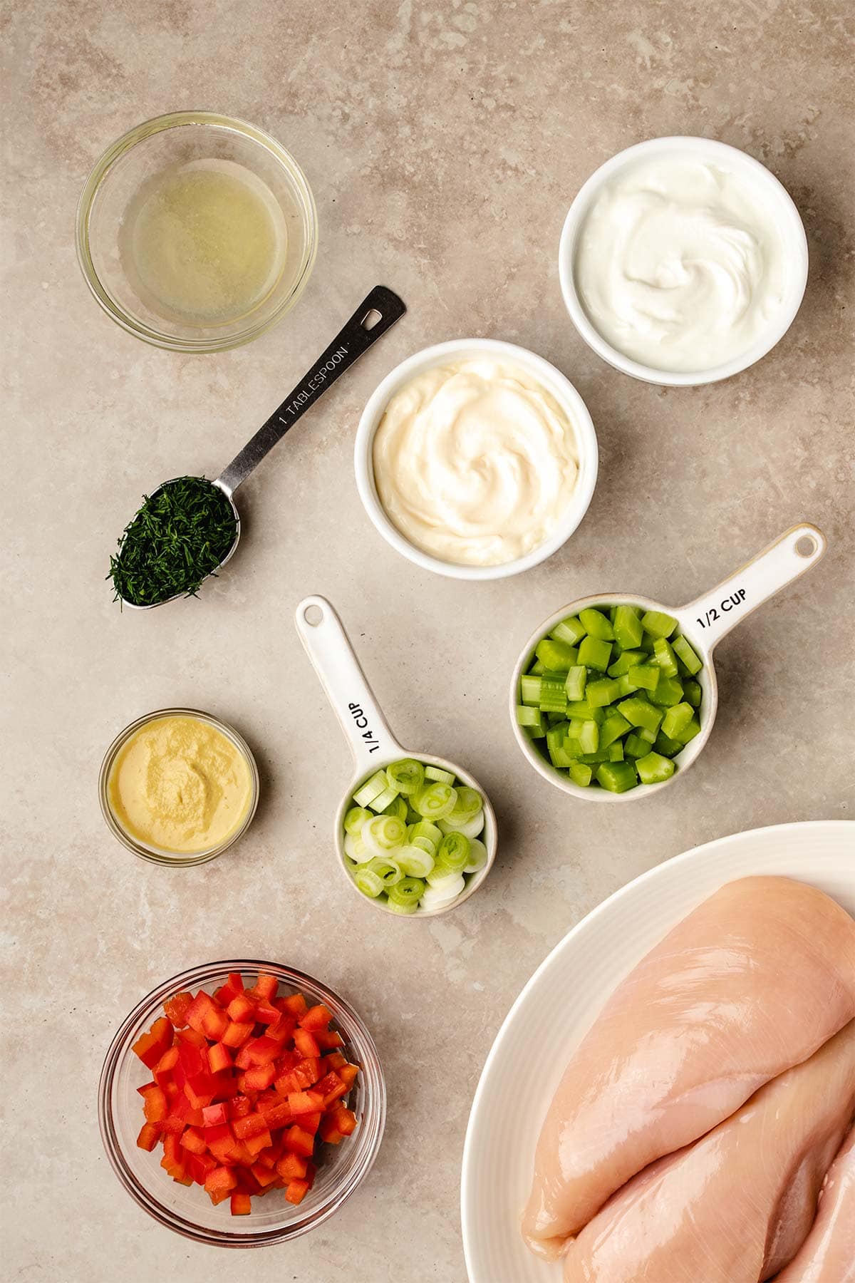 Ingredients needed to make Instant Pot Chicken Salad, viewed from overhead.